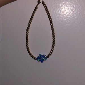 Gold opal bead bracelet.